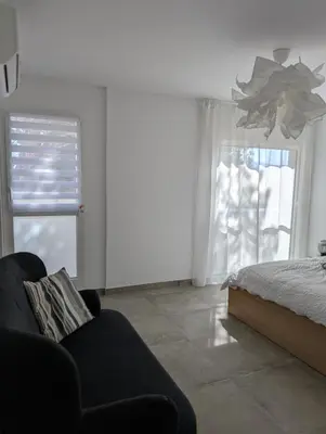 Un ou plusieurs lits dans un hébergement de l'établissement Appartement tout confort à l'Ile-Rousse