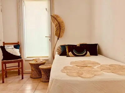 Un ou plusieurs lits dans un hébergement de l'établissement Villa CASAPALMEA
