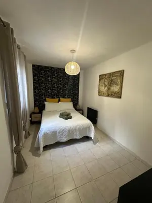 Un ou plusieurs lits dans un hébergement de l'établissement Grand appartement spacieux 3 ch Rez de villa a sisco