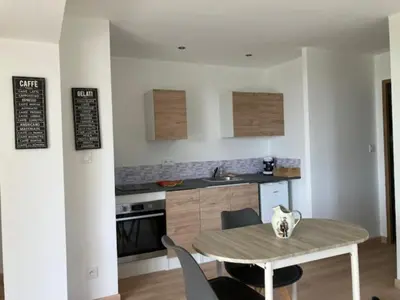 Cuisine ou kitchenette dans l'établissement Villa Type 2