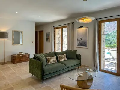 Coin salon dans l'établissement Casa di l'Ortu - Villa neuve avec piscine privée chauffée