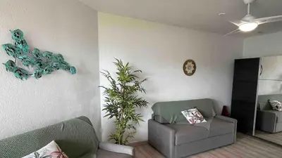 Coin salon dans l'établissement Studio vue Mer 4 personnes climatisé