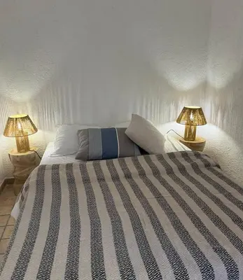 Un ou plusieurs lits dans un hébergement de l'établissement Apartment in Ile Rousse with sea view