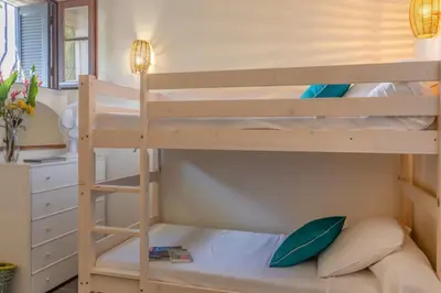 Un ou plusieurs lits dans un hébergement de l'établissement Maison Saligastri