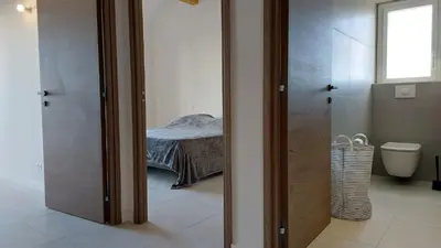 Salle de bains dans l'établissement Duplex T3 neuf de 4 à 6 personnes 5 min à pied du centre et de la plage