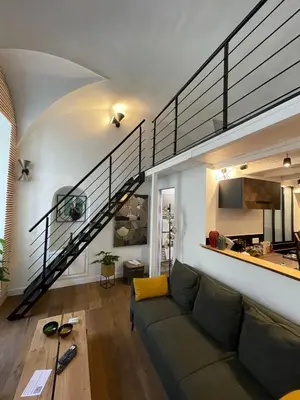 Télévision ou salle de divertissement dans l'établissement Nid douillet - maison Spinola