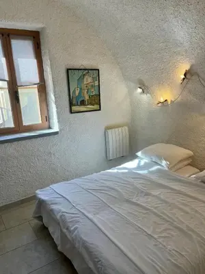 Un ou plusieurs lits dans un hébergement de l'établissement Appartement confortable avec vue sur le port