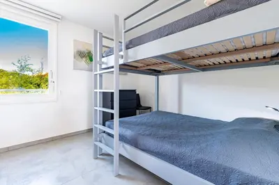 Un ou plusieurs lits dans un hébergement de l'établissement Aloes 14 - Avec terrasse de 36 m²