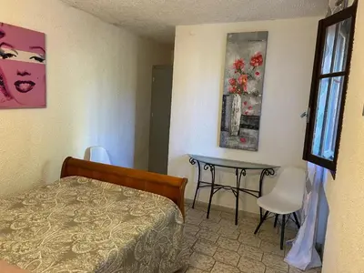 Un ou plusieurs lits dans un hébergement de l'établissement Appartement confortable à Marignana, 50 m² avec 3 chambres