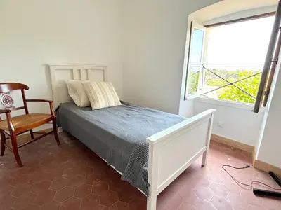 Un ou plusieurs lits dans un hébergement de l'établissement L'appartement Montecristo