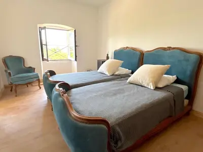 Un ou plusieurs lits dans un hébergement de l'établissement L'appartement Montecristo