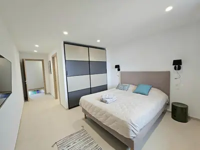 Un ou plusieurs lits dans un hébergement de l'établissement Splendide villa avc piscine-les Collines Bastia