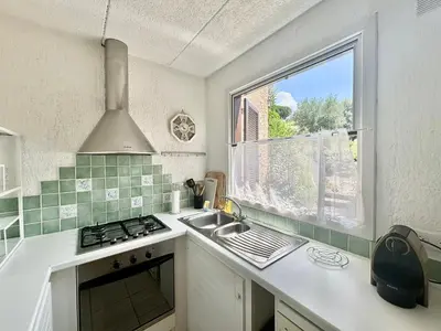 Cuisine ou kitchenette dans l'établissement Appartement T3 Solane 31 LUMIO