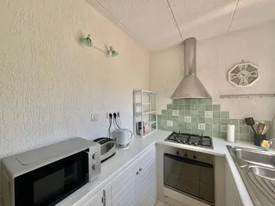 Cuisine ou kitchenette dans l'établissement Appartement T3 Solane 31 LUMIO