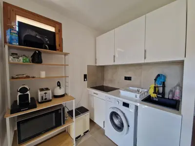 Cuisine ou kitchenette dans l'établissement Super 2 pièces renové Calvi Centre