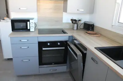 Cuisine ou kitchenette dans l'établissement Villa Nova