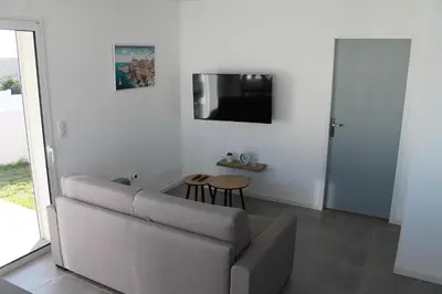Télévision ou salle de divertissement dans l'établissement Villa Nova