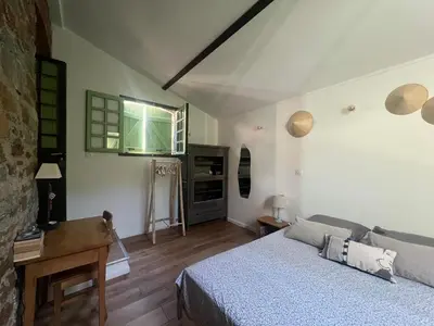 Un ou plusieurs lits dans un hébergement de l'établissement To a Book House in Corsica - chambres d'hôtes