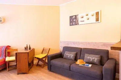 Coin salon dans l'établissement Casa Santa Lucia - Climatisé au bord de Mer