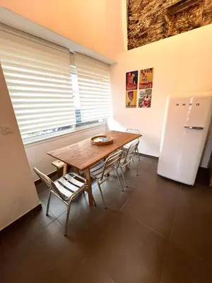 Cuisine ou kitchenette dans l'établissement Maison de village
