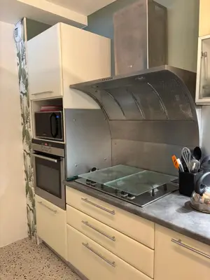 Cuisine ou kitchenette dans l'établissement Bella Suare