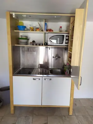 Cuisine ou kitchenette dans l'établissement Studio a petit prix