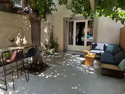 Coin salon dans l'établissement Maison avec Jardin Privé - Monticello
