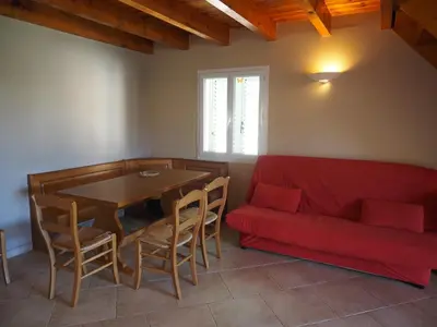Coin salon dans l'établissement Gîtes Santa Maria Cap Corse
