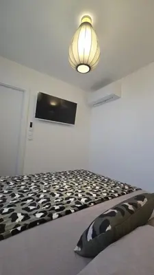 Un ou plusieurs lits dans un hébergement de l'établissement Appartement T2 moderne 2 à 4 personnes