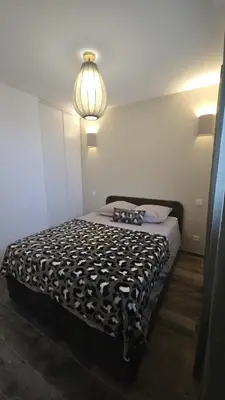 Un ou plusieurs lits dans un hébergement de l'établissement Appartement T2 moderne 2 à 4 personnes