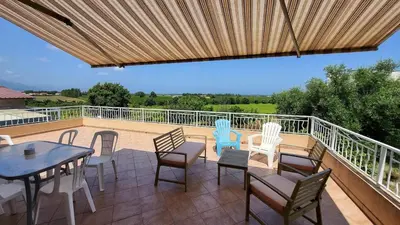 Balcon ou terrasse dans l'établissement Grand appartement Vescovato entre mer et montagne