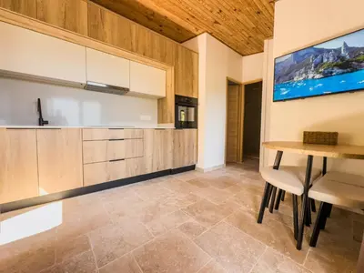 Cuisine ou kitchenette dans l'établissement CAP PARADISU - Chalet vue mer et montagne