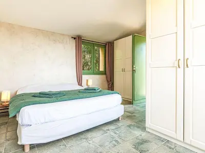 Un ou plusieurs lits dans un hébergement de l'établissement Holiday Home Casa Murato by Interhome