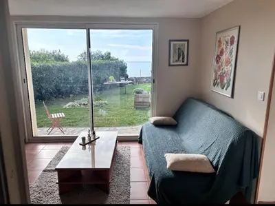 Coin salon dans l'établissement Appartement Elba