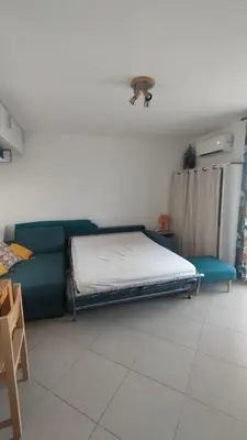 Un ou plusieurs lits dans un hébergement de l'établissement Moriani-Plage 1-bedroom apartment