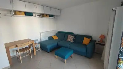 Coin salon dans l'établissement Moriani-Plage 1-bedroom apartment