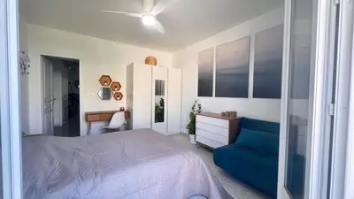 Un ou plusieurs lits dans un hébergement de l'établissement Appartement Le Millie 3 chambres Hyper centre
