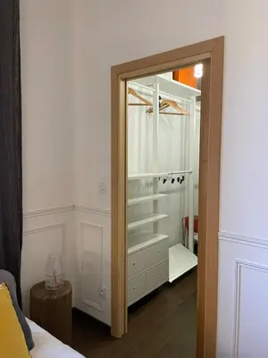 Un ou plusieurs lits dans un hébergement de l'établissement Appartement au charme de l'ancien