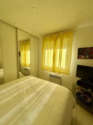 Un ou plusieurs lits dans un hébergement de l'établissement Apartment 2 steps from Ile-Rousse Beach