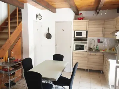 Cuisine ou kitchenette dans l'établissement Pavillon au bord de la mer