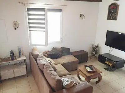 Télévision ou salle de divertissement dans l'établissement Pavillon au bord de la mer