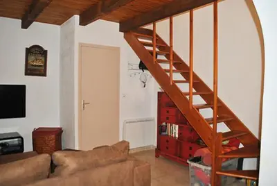 Télévision ou salle de divertissement dans l'établissement Pavillon au bord de la mer
