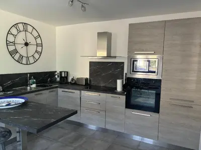 Cuisine ou kitchenette dans l'établissement Chez Suzanne