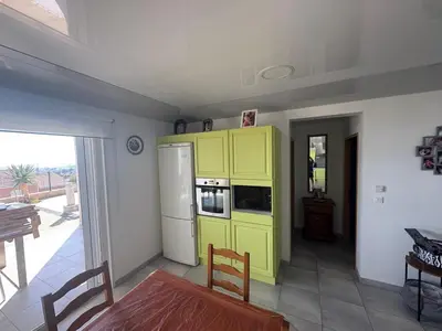 Cuisine ou kitchenette dans l'établissement Paradiso Apartment 4 people