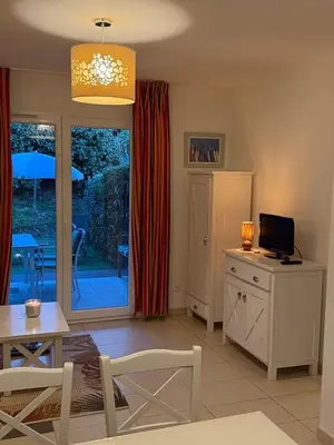 Télévision ou salle de divertissement dans l'établissement Villa de BELGODERE