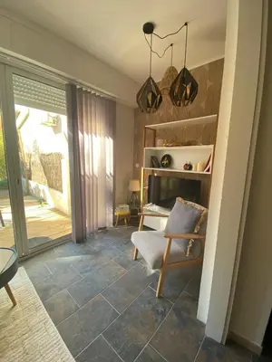 Coin salon dans l'établissement Cozy cocoon 300m de la plage
