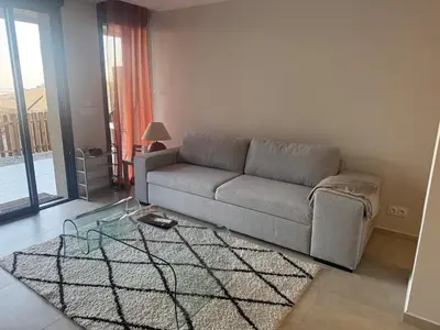 Coin salon dans l'établissement Appartement vue mer et montagne