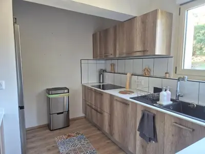 Cuisine ou kitchenette dans l'établissement Mer et Montagne Appartement Prestigieux 7 couchages et salle de sport