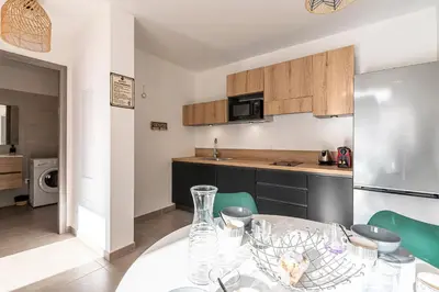 Cuisine ou kitchenette dans l'établissement Casa Fangu - Balcon avec Vue Port et Montagnes