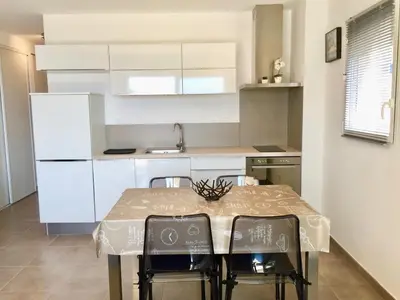 Cuisine ou kitchenette dans l'établissement Appartement vue mer centre